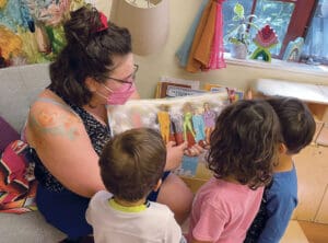 Teacher with children