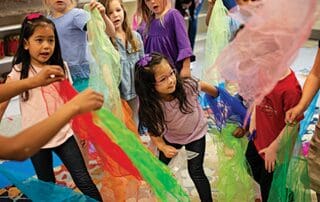 Children enjoying music through movement