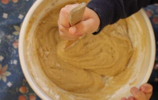 Child mixing batter