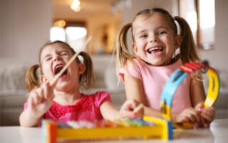 Two children playing music together