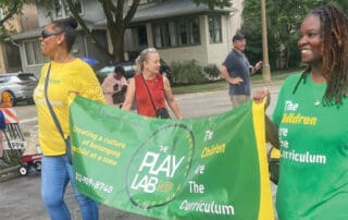 The Play Lab Foundation staff at a parade