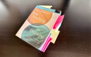 From Teaching to Thinking book with many bookmarks