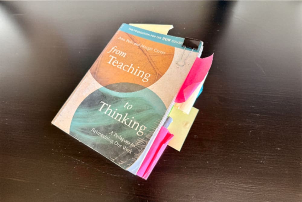 From Teaching to Thinking book with many bookmarks