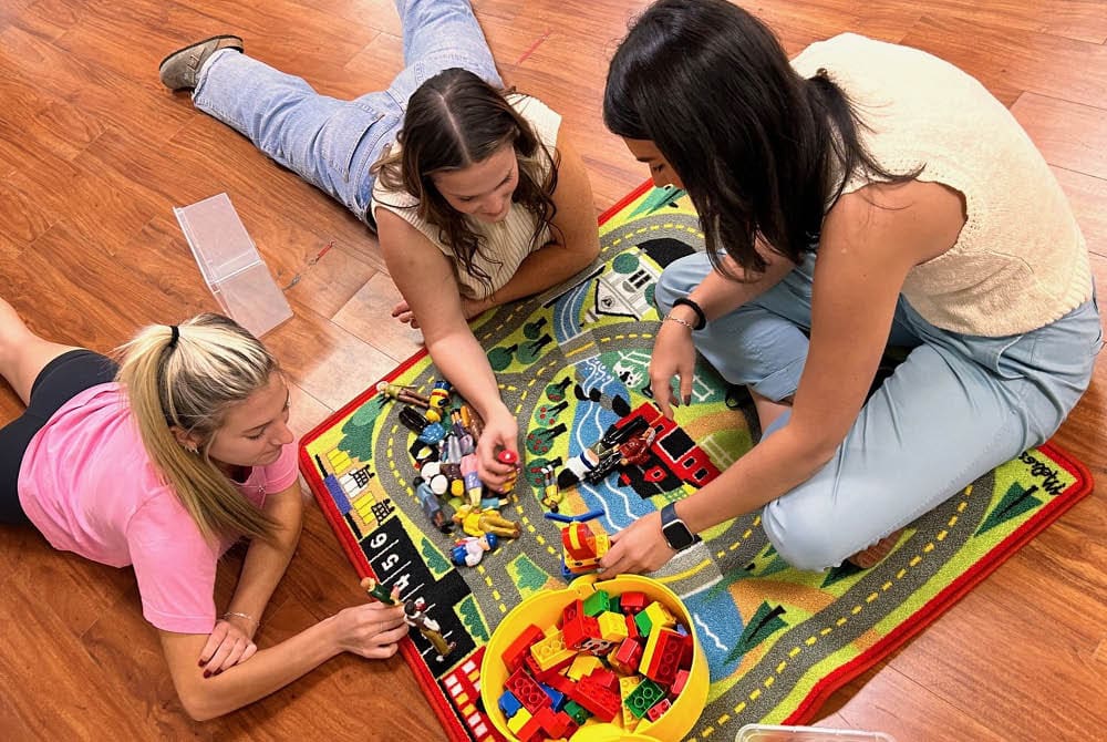 Group of educators play together